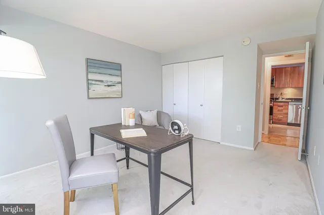 a view of a park with sitting area