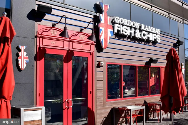 a bench sitting in front of building