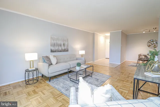 a living room with furniture and a couch