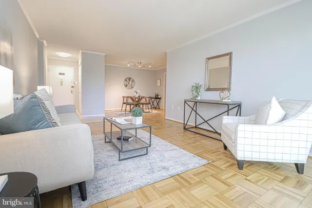 a dining room with a table and chairs