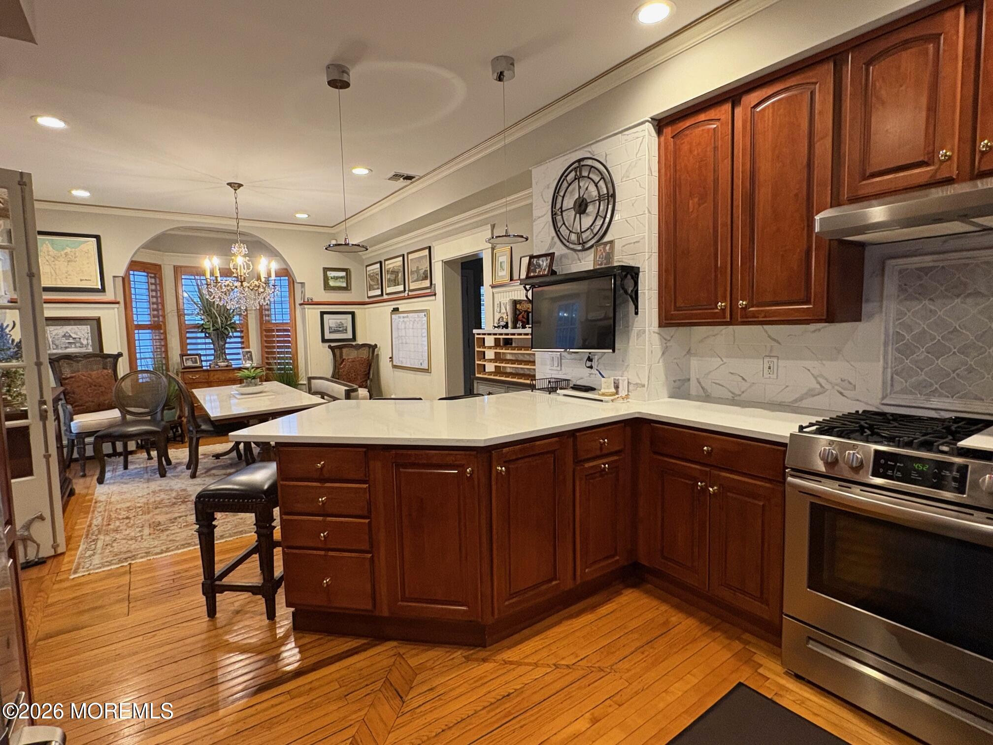 162 Bridge Avenue Red Bank, NJ 07701 - Photo 12 of 27 a kitchen with a sink cabinets and wooden floor