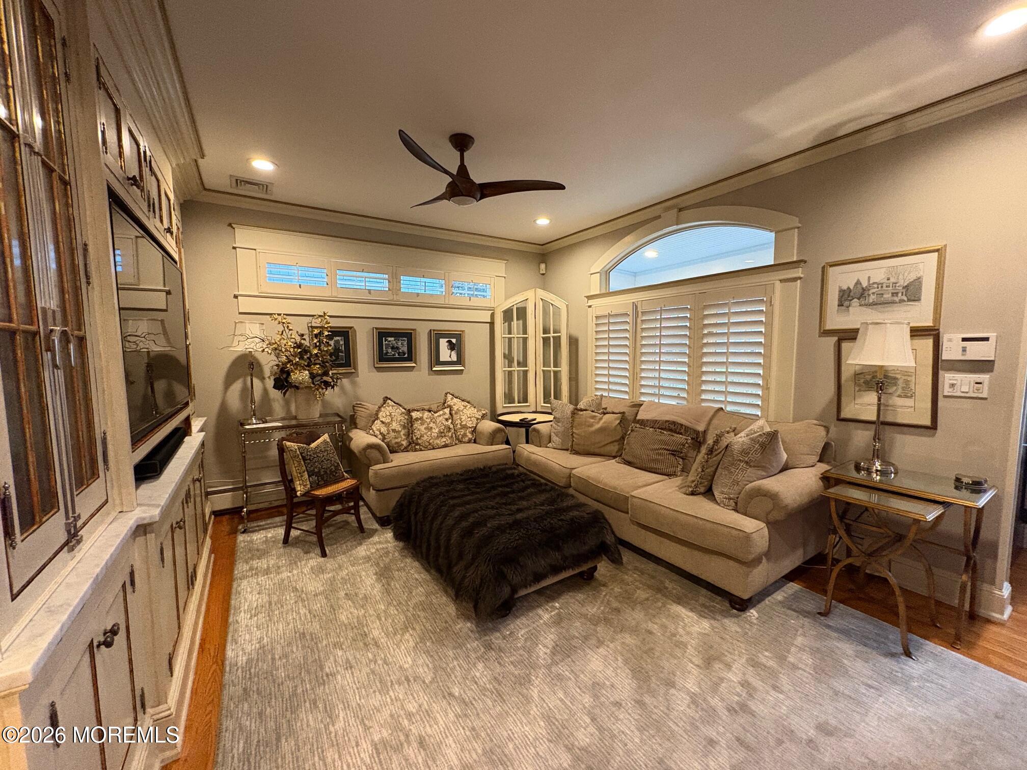 162 Bridge Avenue Red Bank, NJ 07701 - Photo 3 of 27 a living room with furniture and a flat screen tv