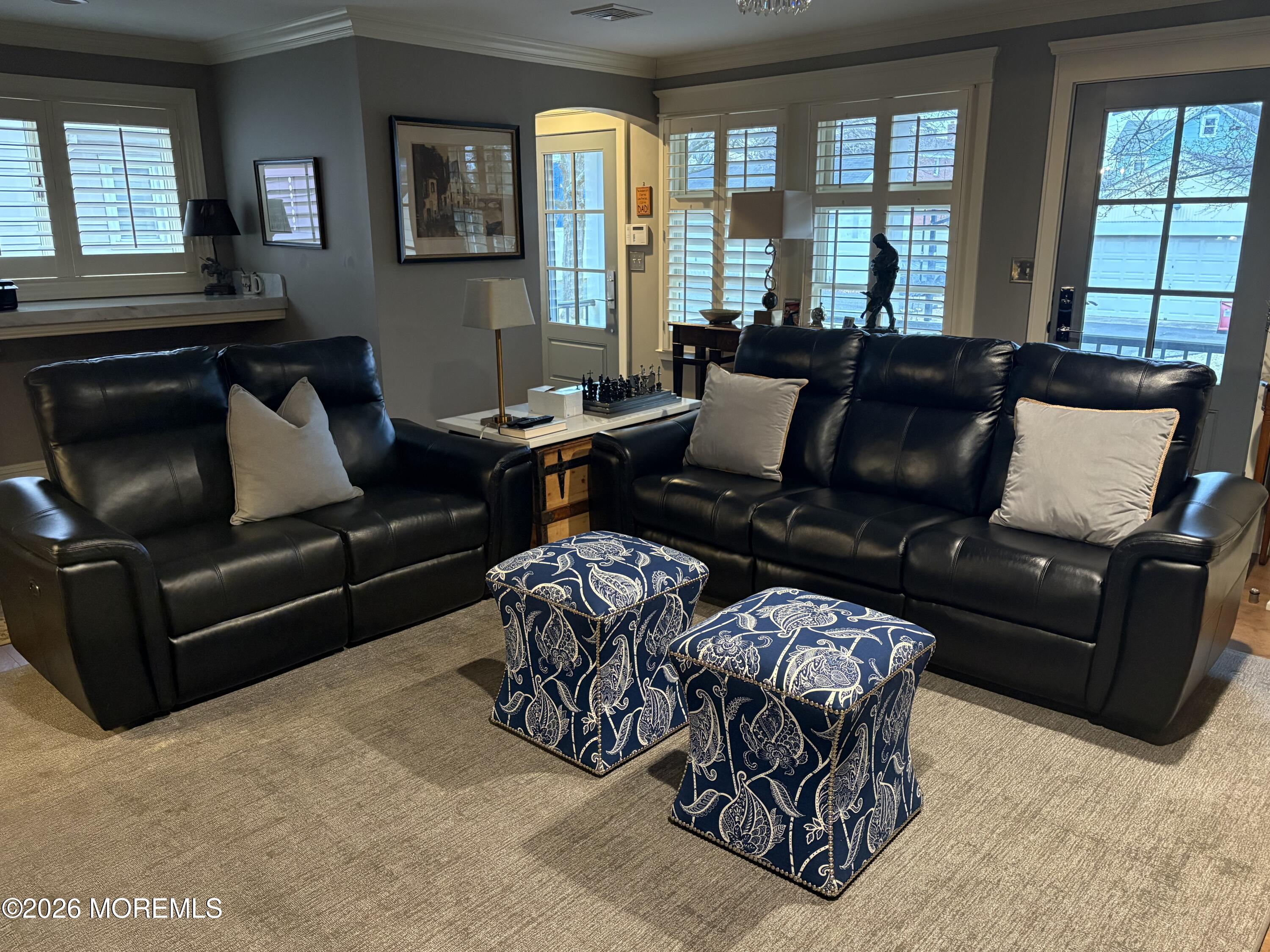 162 Bridge Avenue Red Bank, NJ 07701 - Photo 8 of 27 a living room with furniture and large windows
