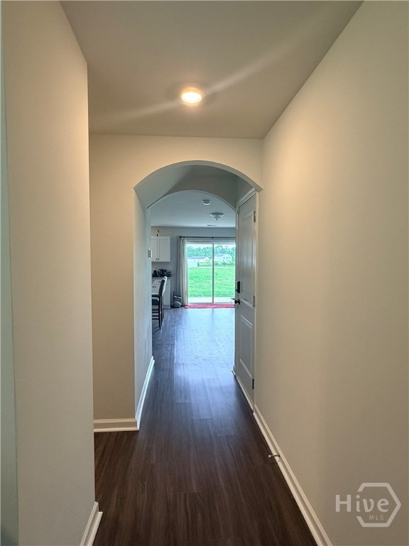 1244 Wilkins Road Midway, GA 31320 - Photo 15 of 58 Hallway leading towards, half bath, living area, and kitchen