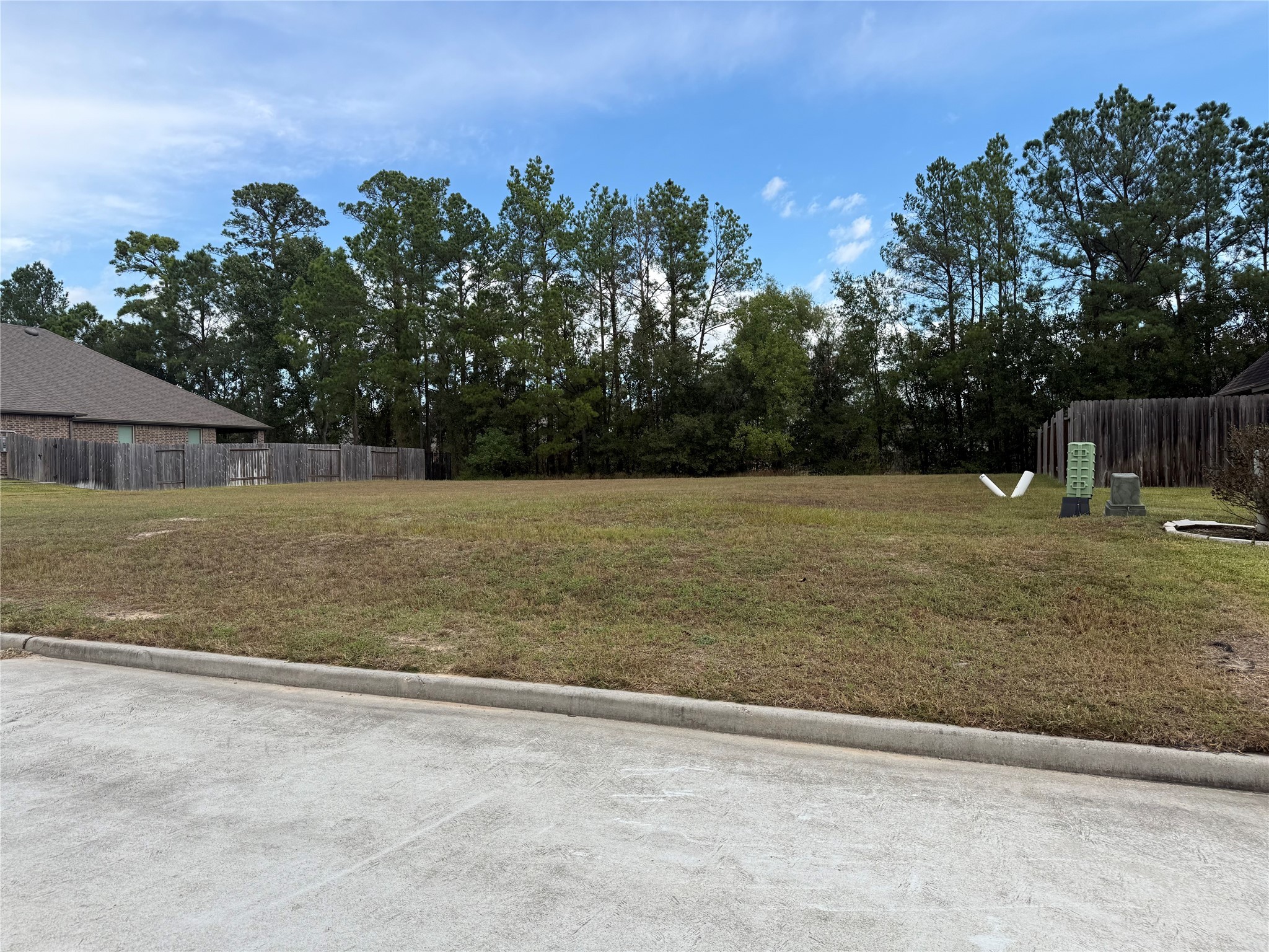 15706 Gibson Grass Court Spring, TX 77379 - Photo 1 of 5 a view of a yard with a trampoline