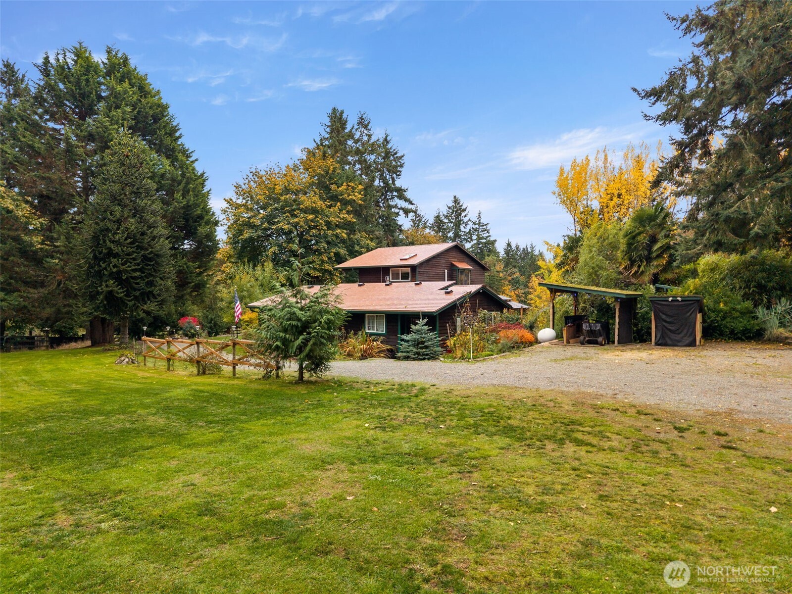 4914 182nd Avenue Southwest Longbranch, WA 98351 - Photo 11 of 40 a front view of a house with a yard
