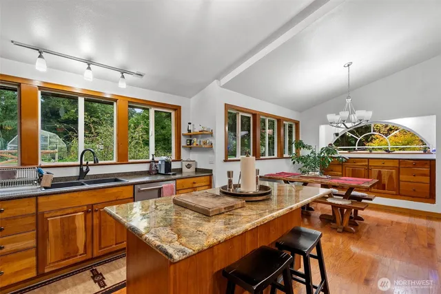 a room with lots of table and chairs