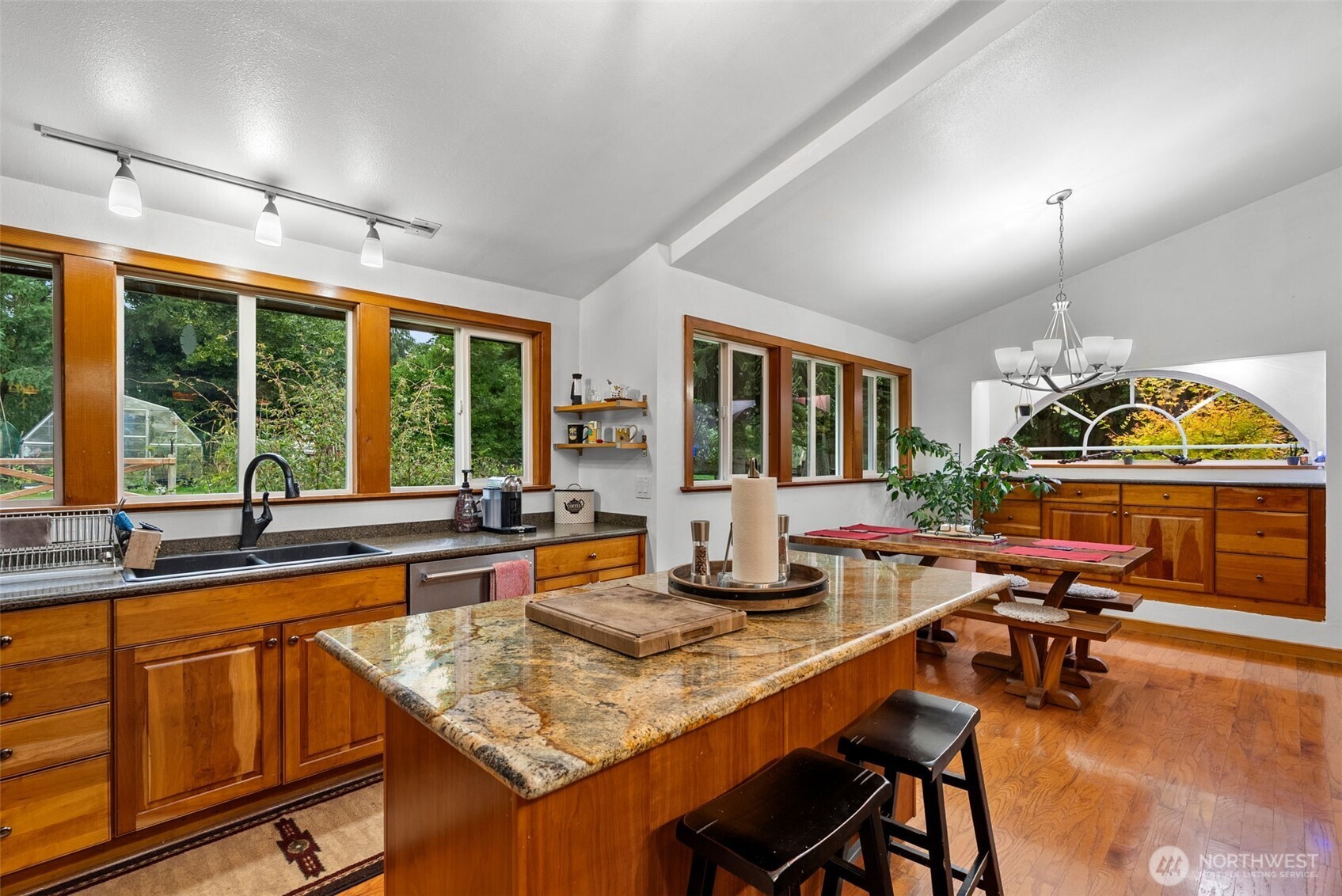 4914 182nd Avenue Southwest Longbranch, WA 98351 - Photo 18 of 40 a room with lots of table and chairs