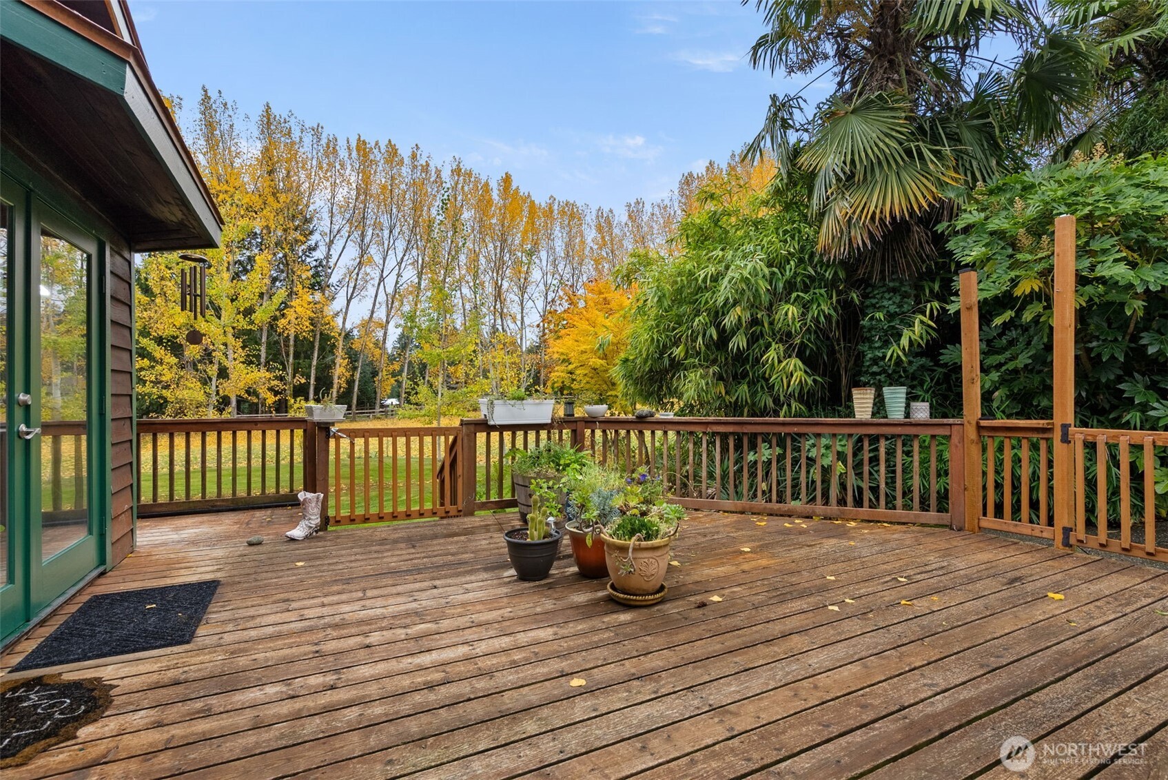 4914 182nd Avenue Southwest Longbranch, WA 98351 - Photo 21 of 40 a view of balcony with wooden floor and fence