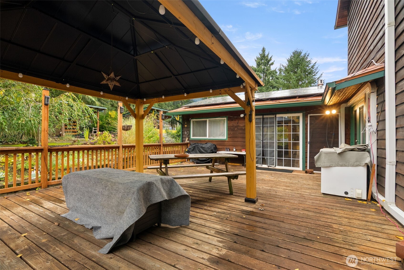 4914 182nd Avenue Southwest Longbranch, WA 98351 - Photo 22 of 40 a outdoor view with a sitting space