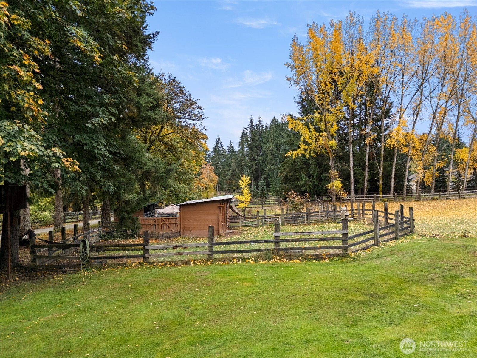 4914 182nd Avenue Southwest Longbranch, WA 98351 - Photo 34 of 40 a view of a house with a yard