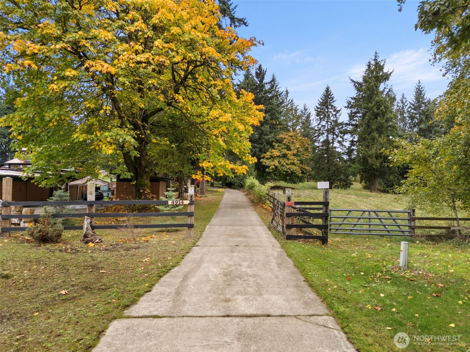 4914 182nd Avenue Southwest Longbranch, WA 98351 - Photo 5 of 40 a view of swimming pool with outdoor seating and trees