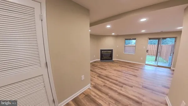 a view of livingroom with hardwood floor and a ceiling fan
