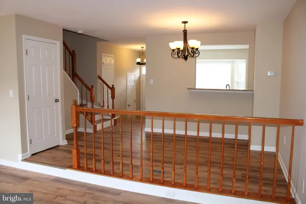 a view of entryway with wooden floor