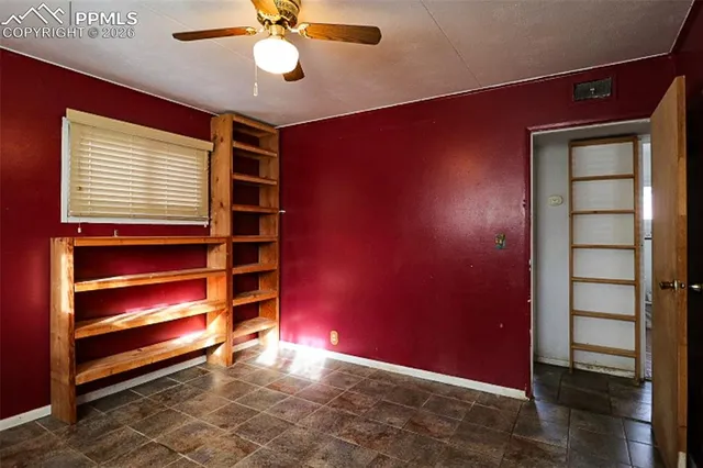 a view of room with closet and window