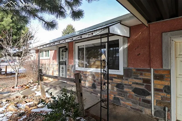a front view of a house with yard