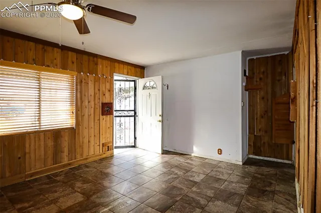 a view of an empty room and window