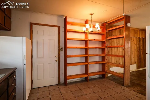 a view of a room with rack on the wall