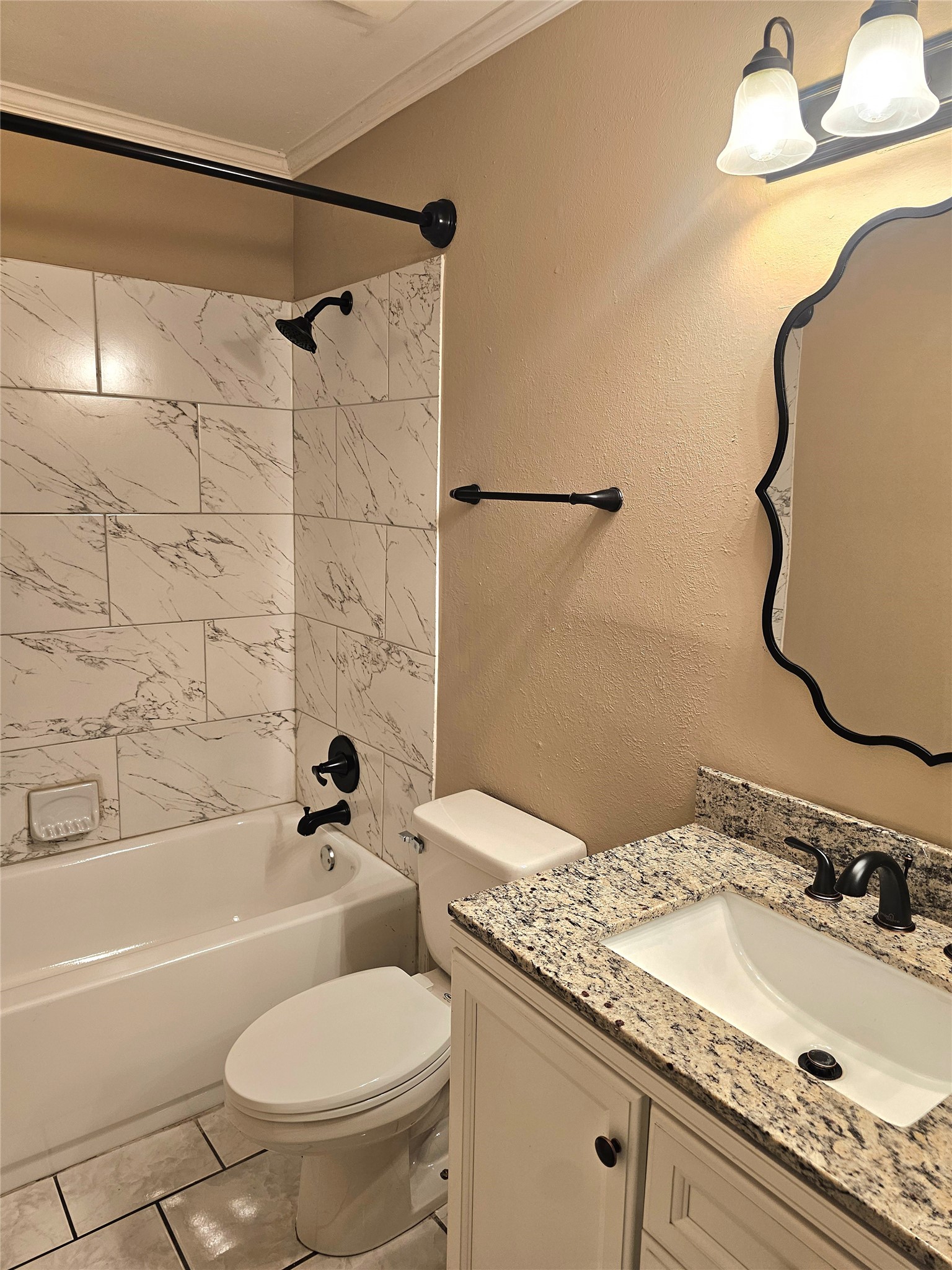 16718 Running Quail Court Houston, TX 77489 - Photo 24 of 33 a bathroom with a granite countertop sink toilet and shower