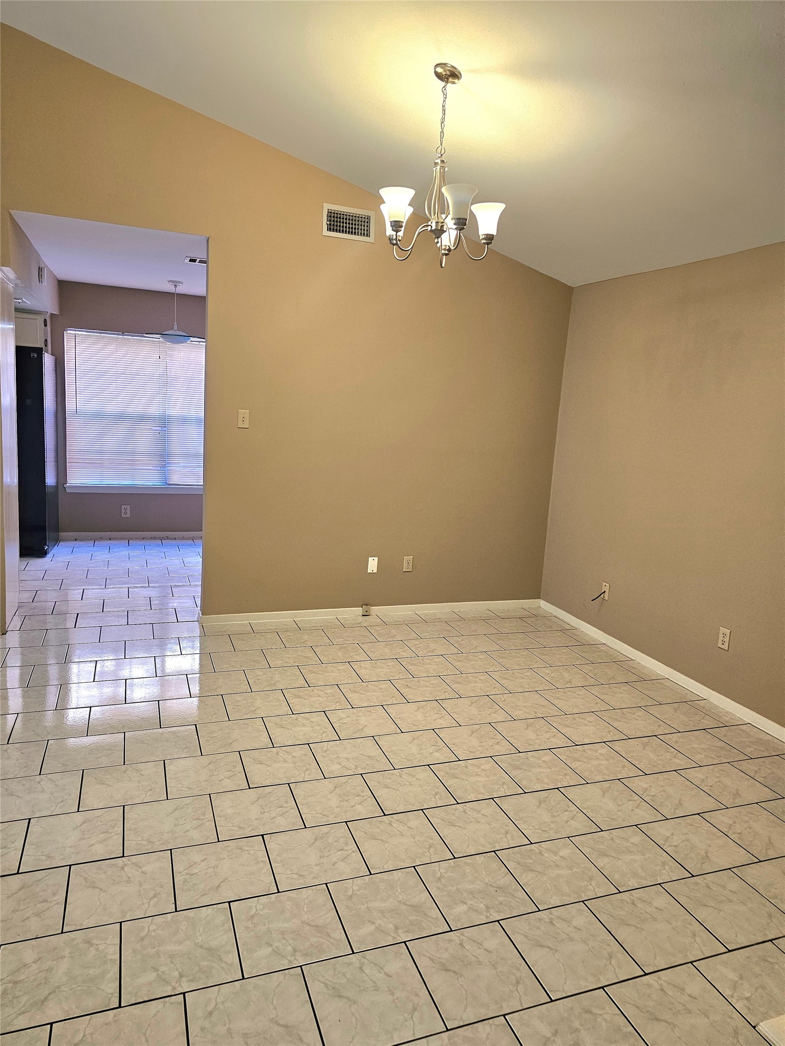 16718 Running Quail Court Houston, TX 77489 - Photo 7 of 33 a view of a livingroom with a chandelier fan
