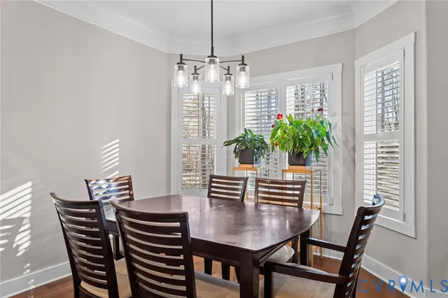 a kitchen with stainless steel appliances granite countertop sink stove and refrigerator