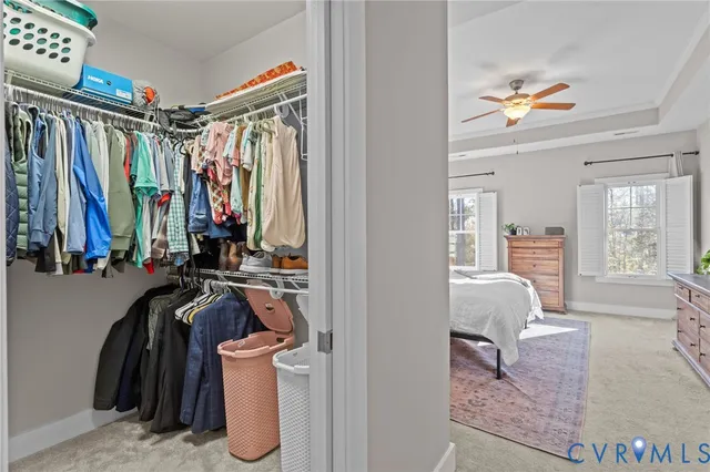 a bathroom with a double vanity sink mirror and bathtub