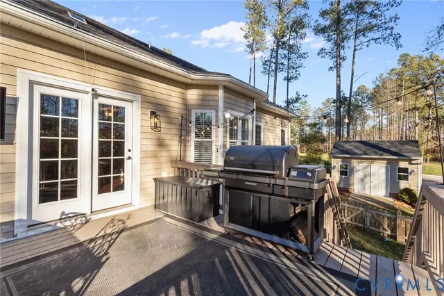 a front view of a house with large windows
