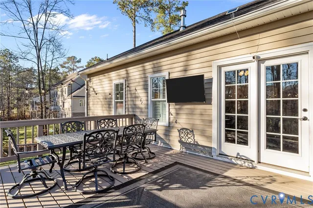 a view of balcony with furniture