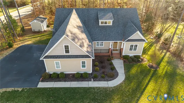 a view of a house with a tree