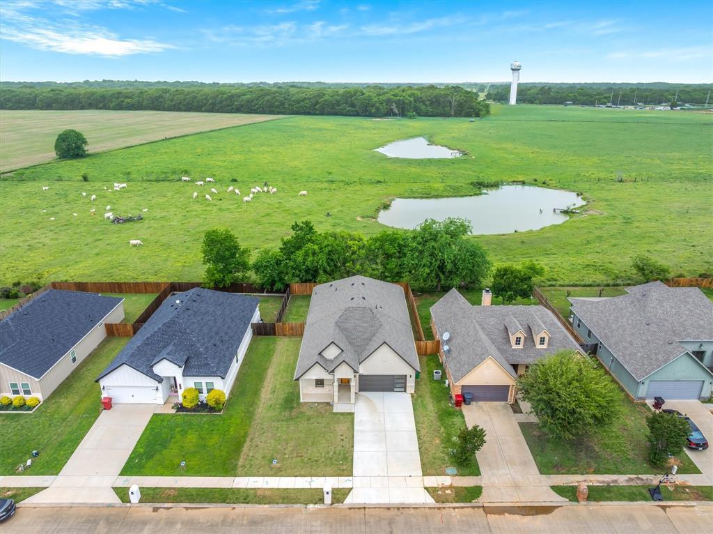 1868 Meadowview Canton, TX 75103 - Photo 2 of 40 an aerial view of a house with outdoor space lake view and mountain view