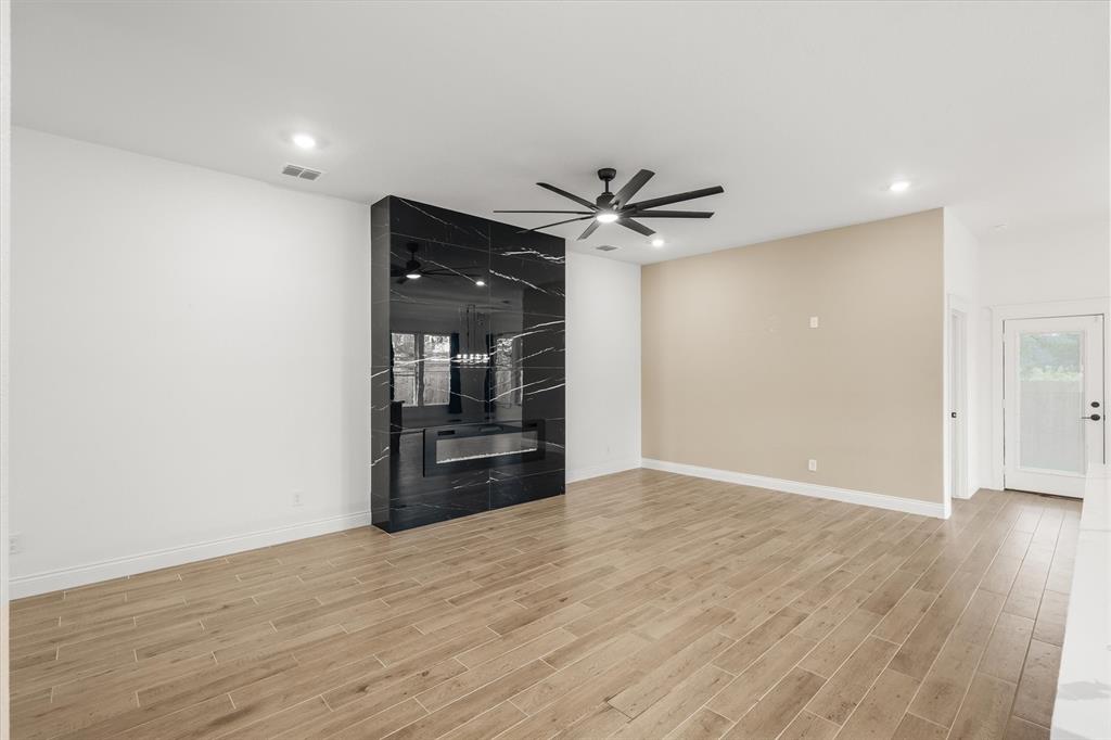 1868 Meadowview Canton, TX 75103 - Photo 24 of 40 a view of empty room with wooden floor and fan
