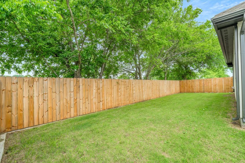 1868 Meadowview Canton, TX 75103 - Photo 40 of 40 a view of backyard with tree