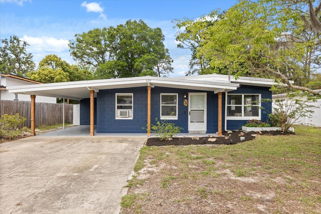 609 East Highland Street Altamonte Springs, FL 32701 - Photo 1 of 35 front view of a house with a yard