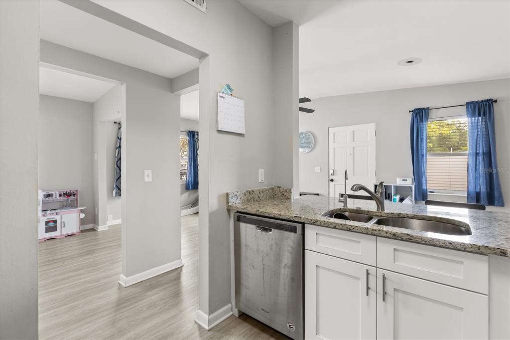 609 East Highland Street Altamonte Springs, FL 32701 - Photo 11 of 35 a bathroom with a sink and a mirror