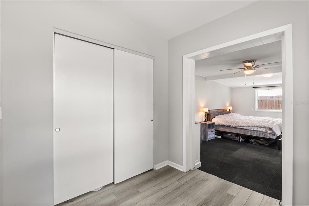 609 East Highland Street Altamonte Springs, FL 32701 - Photo 18 of 35 a bedroom with a bed and wooden floor