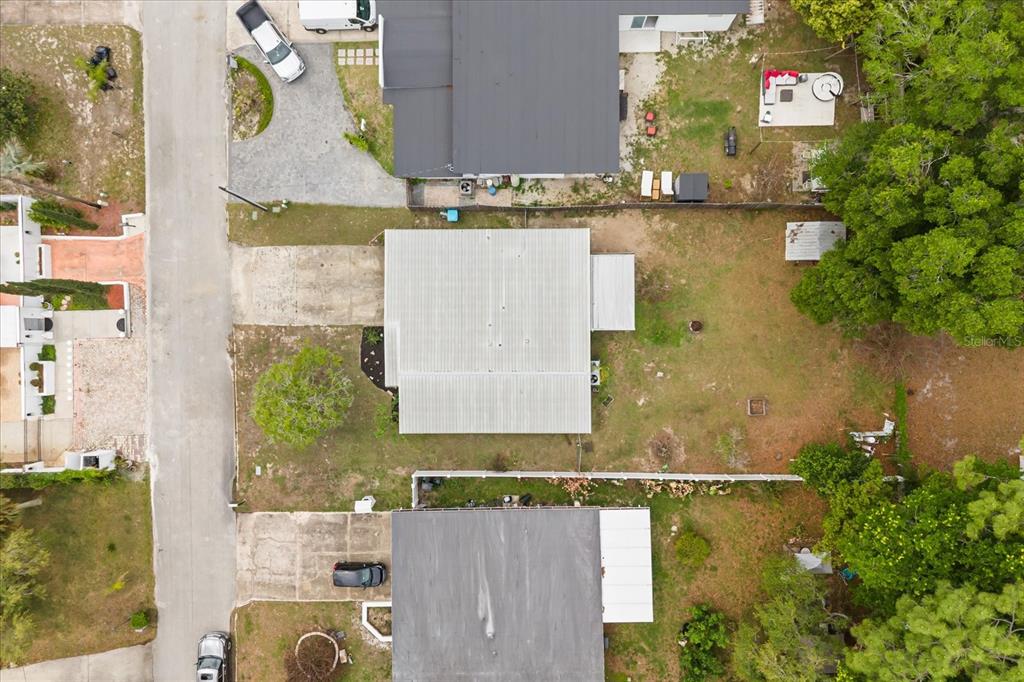 609 East Highland Street Altamonte Springs, FL 32701 - Photo 30 of 35 an aerial view of a house with a lake view