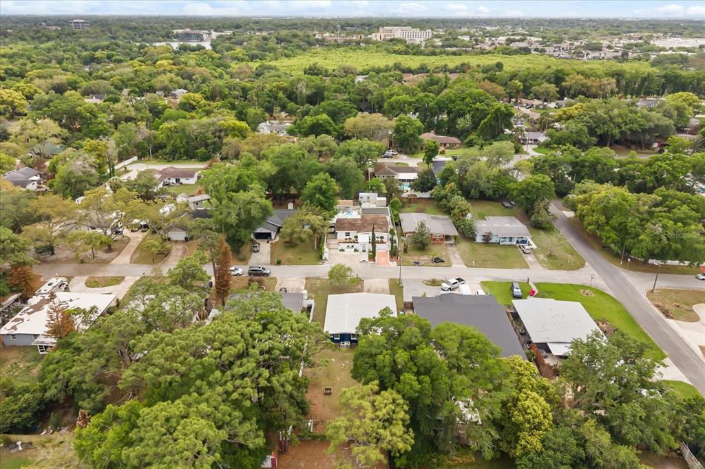 609 East Highland Street Altamonte Springs, FL 32701 - Photo 32 of 35 an aerial view of residential houses with outdoor space and trees