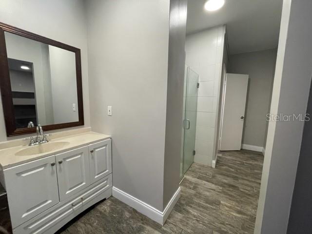 704 Southwest 6th Street Okeechobee, FL 34974 - Photo 16 of 21 a bathroom with a sink and a mirror