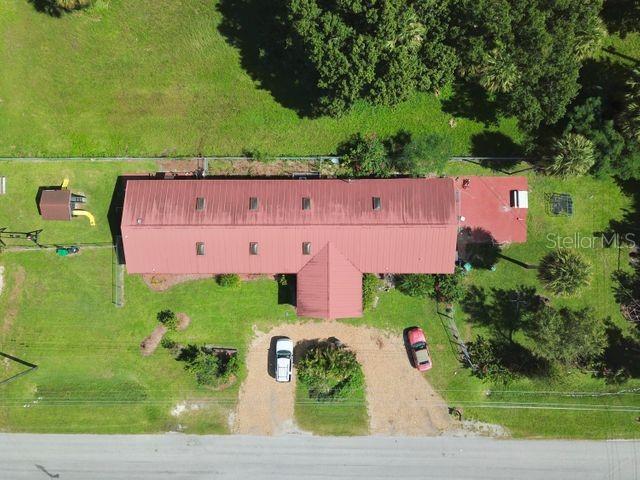 704 Southwest 6th Street Okeechobee, FL 34974 - Photo 6 of 21 an aerial view of a house