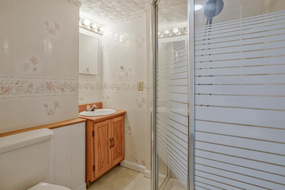 8070 Nursery Road Lusby, MD 20657 - Photo 37 of 47 Lower level bathroom with shower.