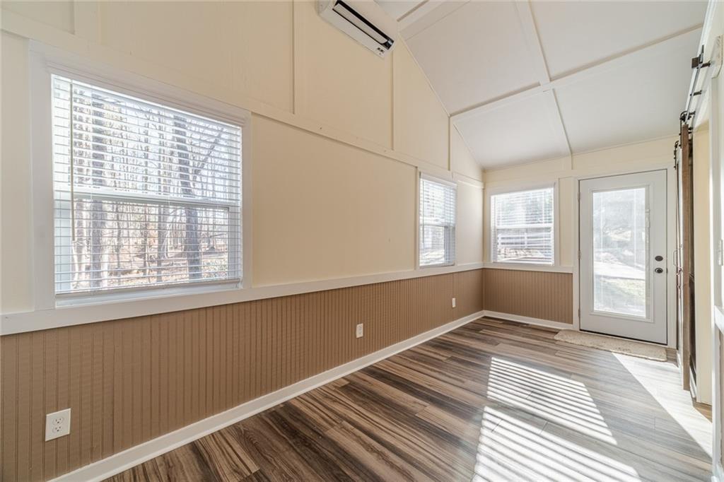 3240 Stewart Lake Road Monroe, GA 30655 - Photo 22 of 68 a view of an empty room with a window