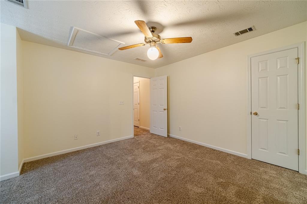 3240 Stewart Lake Road Monroe, GA 30655 - Photo 39 of 68 a view of an empty room