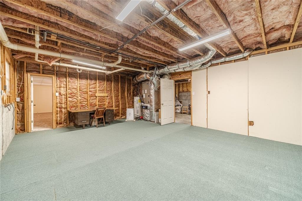 3240 Stewart Lake Road Monroe, GA 30655 - Photo 49 of 68 a view of an empty room with a window