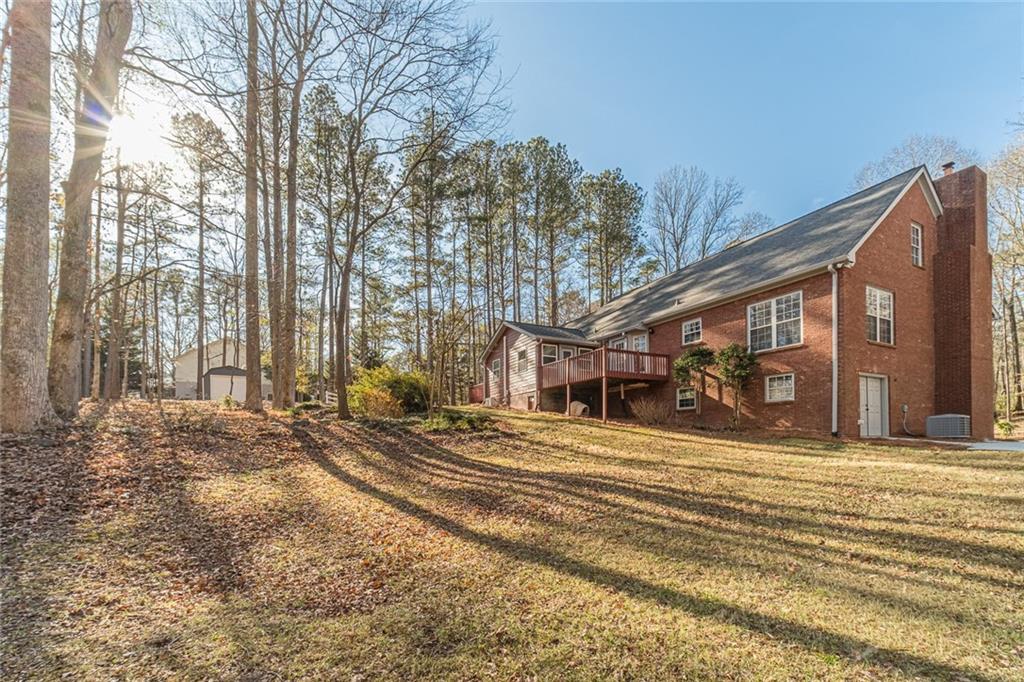 3240 Stewart Lake Road Monroe, GA 30655 - Photo 52 of 68 a view of a house with a outdoor space