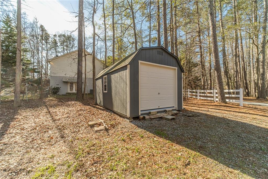 3240 Stewart Lake Road Monroe, GA 30655 - Photo 55 of 68 a house view with a outdoor space