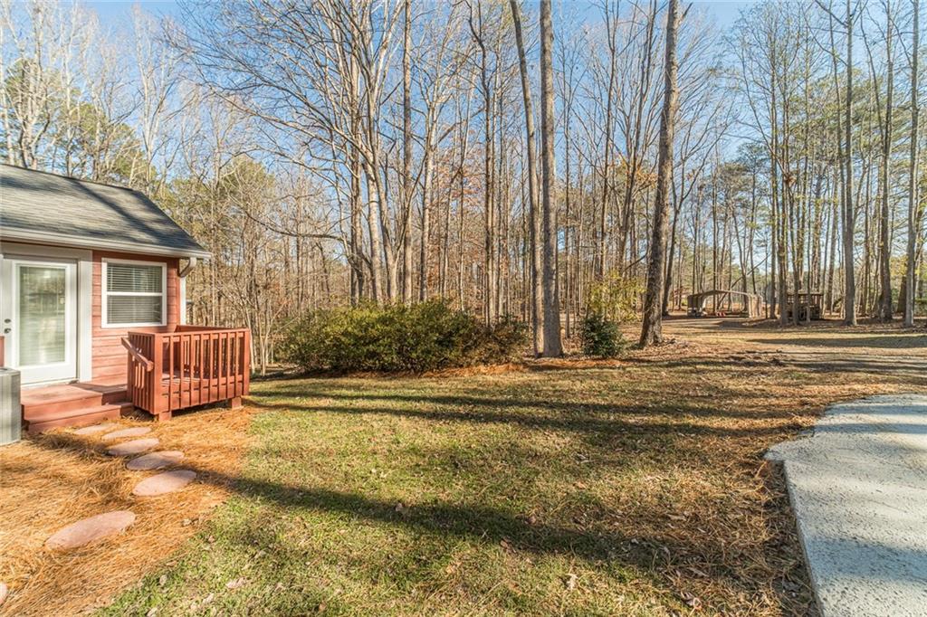 3240 Stewart Lake Road Monroe, GA 30655 - Photo 57 of 68 a house view with a outdoor space