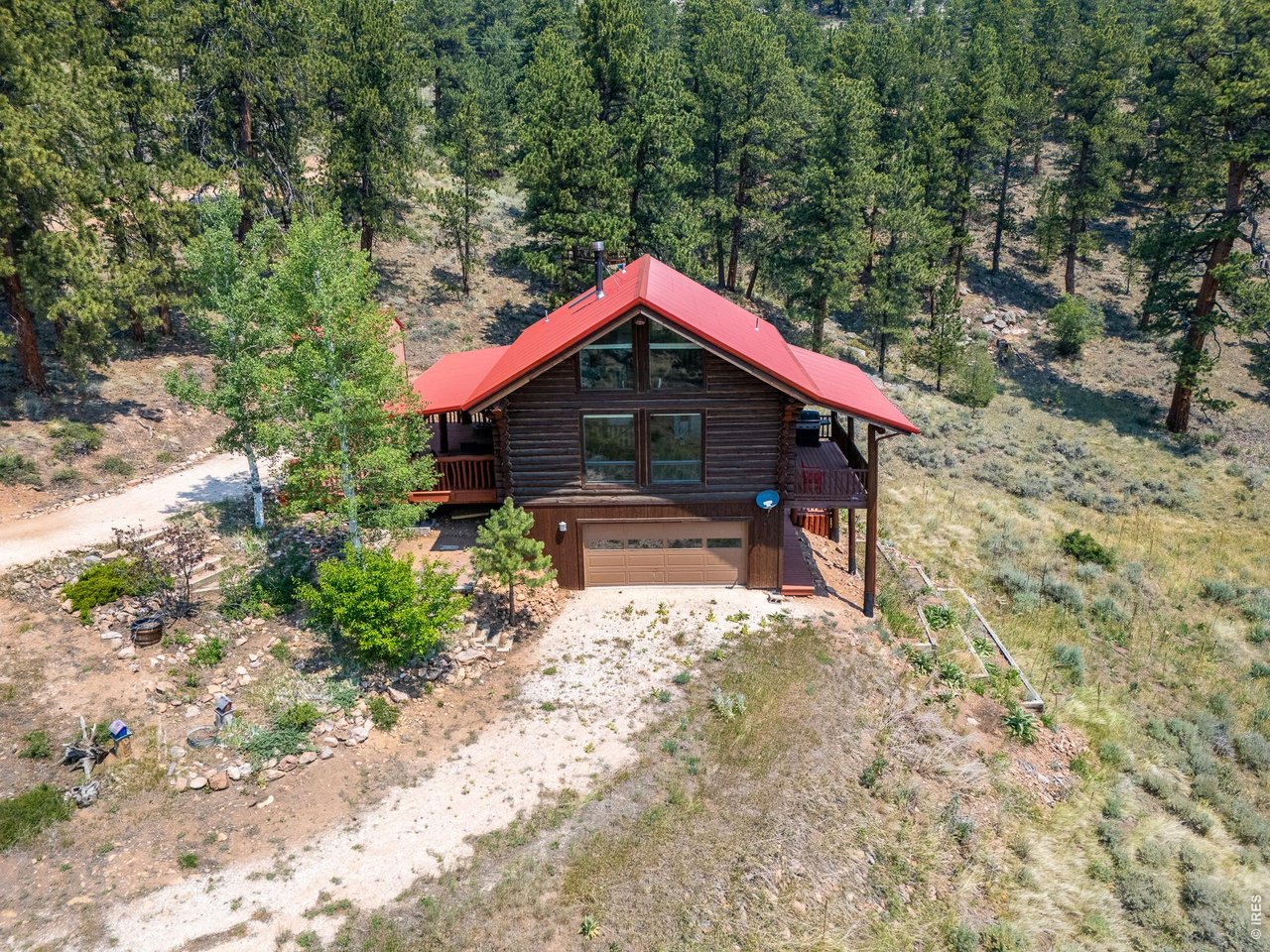 296 Caddo Road Red Feather Lakes, CO 80545 - Photo 29 of 50 Newly stained with a metal roof.