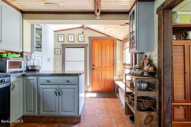 a view of a kitchen with a window