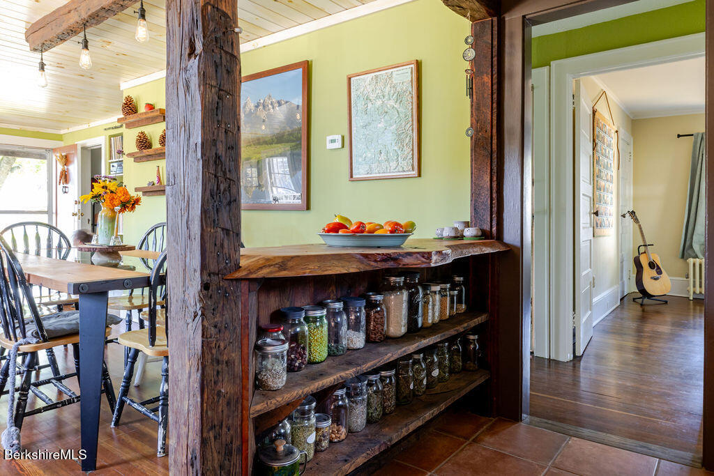 6 Locust Street Great Barrington, MA 01230 - Photo 14 of 36 a room with furniture and a book shelf