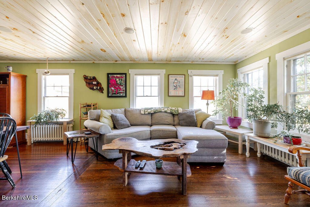 6 Locust Street Great Barrington, MA 01230 - Photo 17 of 36 a living room with furniture and wooden floor